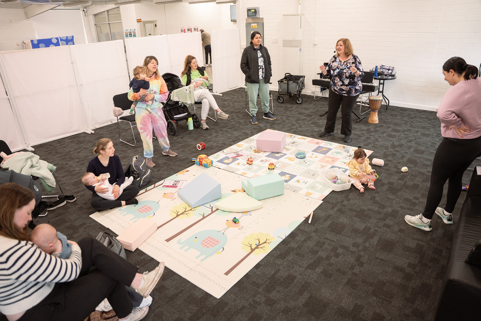 Group of mums and children singing in 